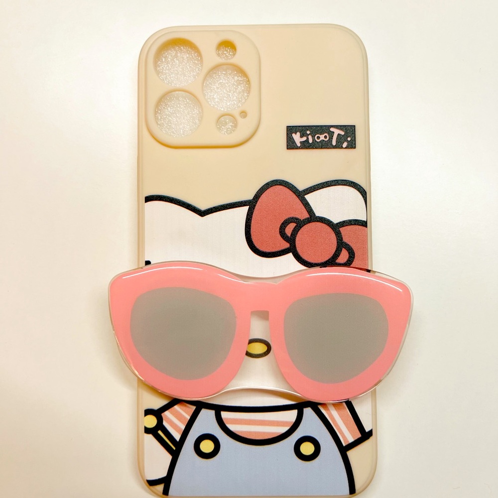Hello Kitty Phone case with phone stand. Iphone 13 max plus. only used two days.
